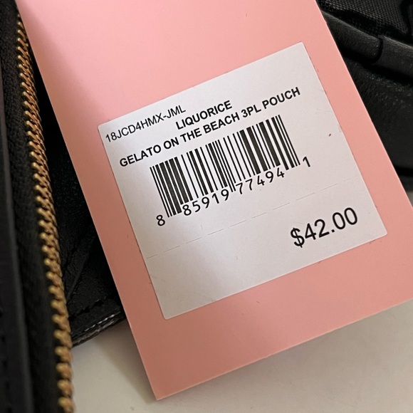 Juicy Couture Black Gelato On The Beach 3
Pouches & Wristlet Strap NWT - Picture 4 of 13